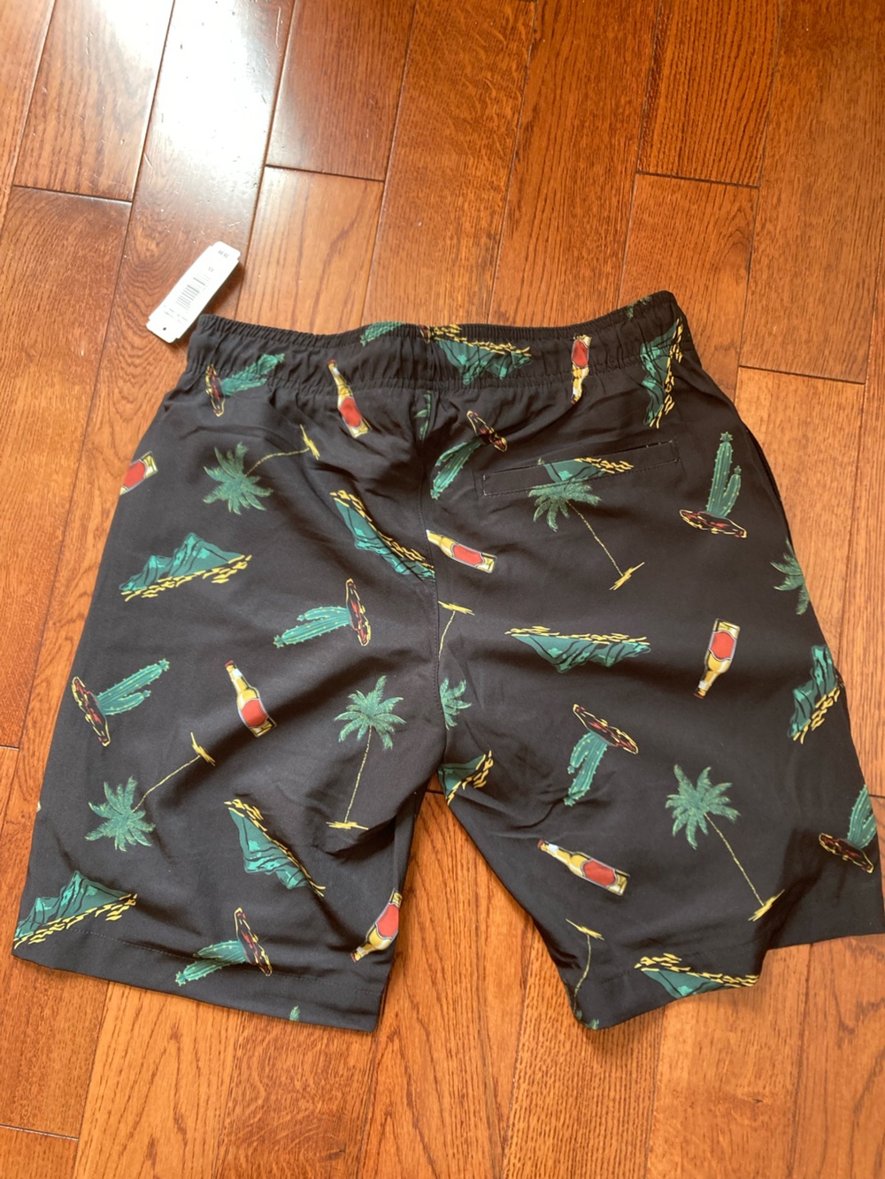 Men's Black Tropical Print Swim Trunks